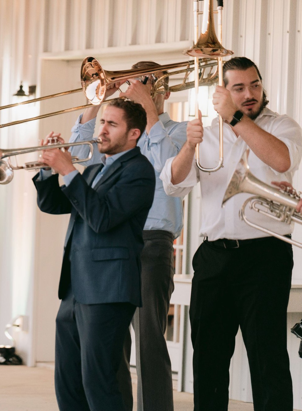 The Right Tempo's horn section performing